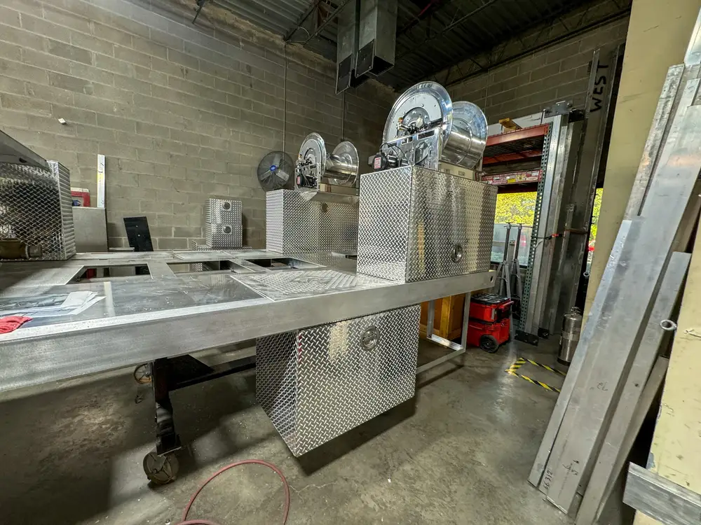 Open compartment interior during fabrication, photo 174 of 303.